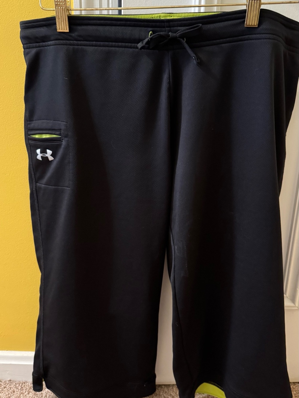 Under Armour Black and Neon Green HeatGear Cropped Workout Pants